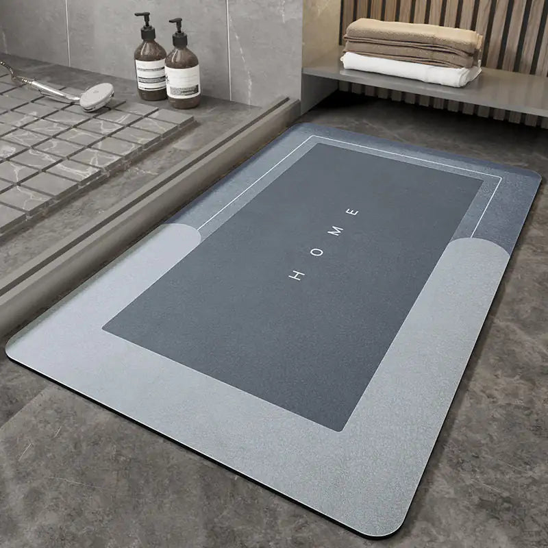 rectangular blue Napa Skin Super Absorbent Bath Mat on floor near a shower