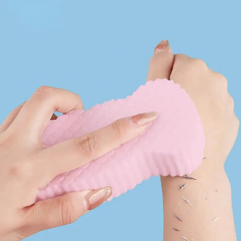 Exfoliating Bath Sponge being used on a hand