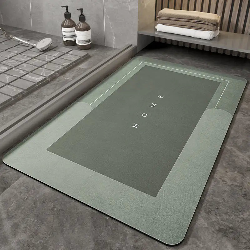 rectangular gray Napa Skin Super Absorbent Bath Mat on floor near a shower