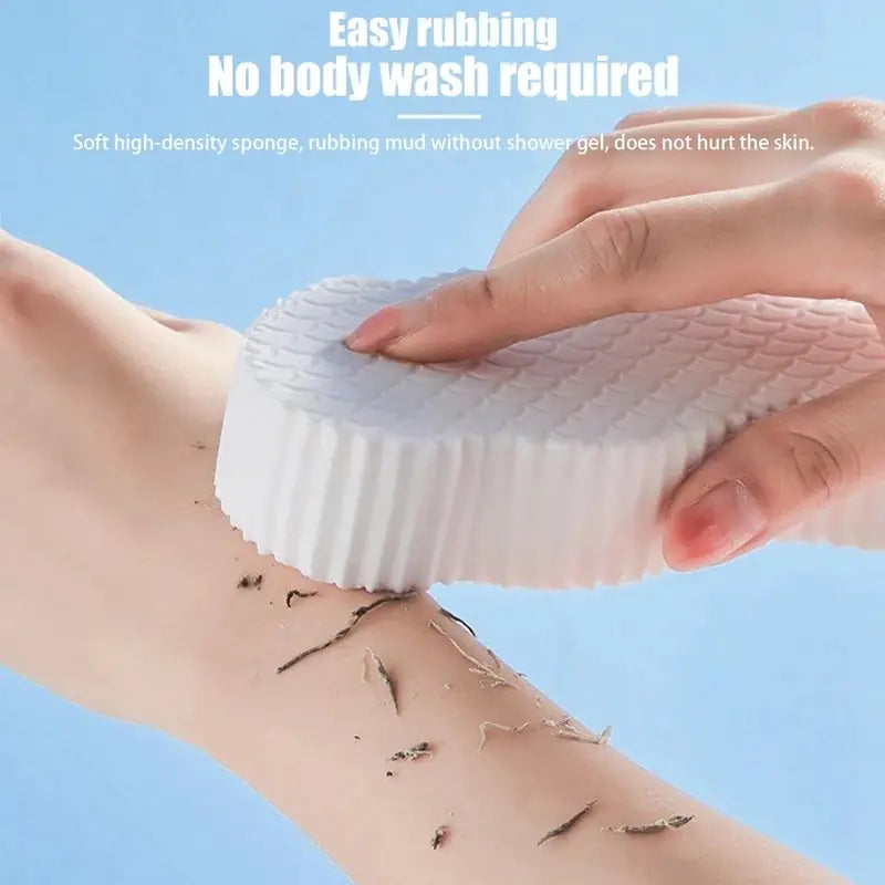 Exfoliating Bath Sponge being used on an arm with no body wash