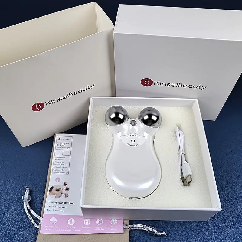 white Microcurrent Face Massager with box packaging and USB charger cord