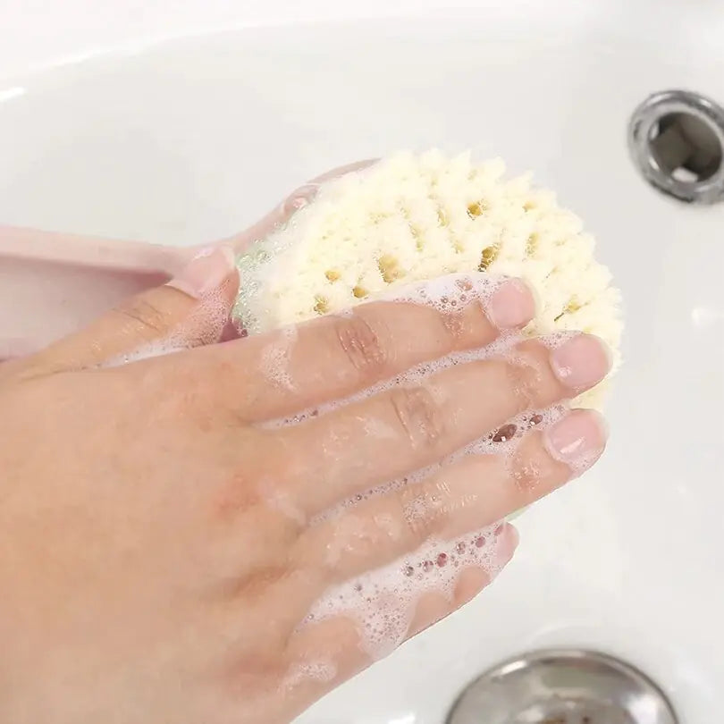 Soapy lather on the bristles of the brush