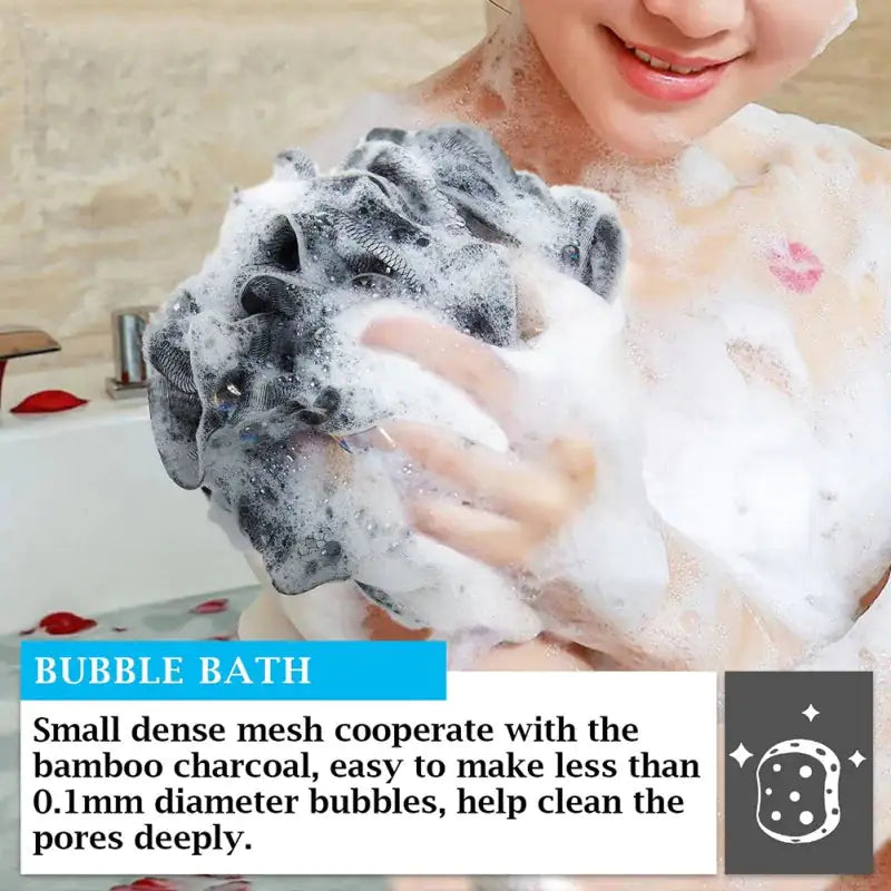 bamboo charcoal bath loofa poof being used in a bubble bath